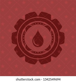 drop icon inside red emblem. Retro