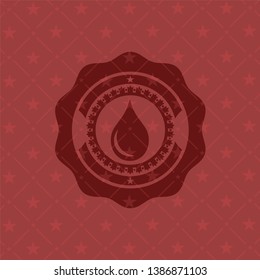 drop icon inside red emblem
