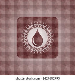 drop icon inside red seamless emblem with geometric pattern.
