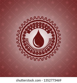 drop icon inside retro red emblem
