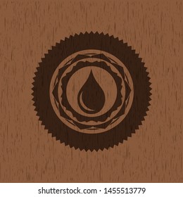 drop icon inside retro style wooden emblem