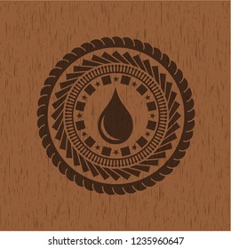 drop icon inside retro wood emblem