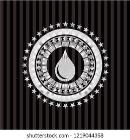 drop icon inside silver emblem or badge