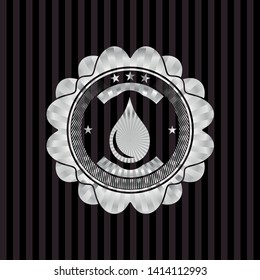 drop icon inside silvery badge or emblem