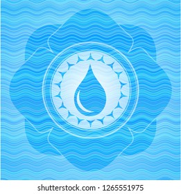 drop icon inside sky blue water wave style emblem.
