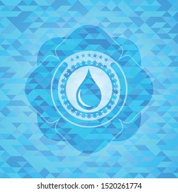 drop icon inside sky blue emblem with triangle mosaic background