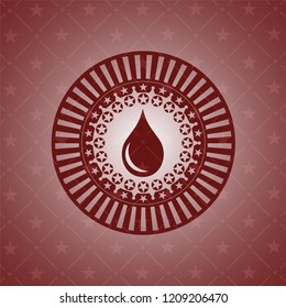 drop icon inside vintage red emblem