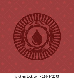 drop icon inside vintage red emblem