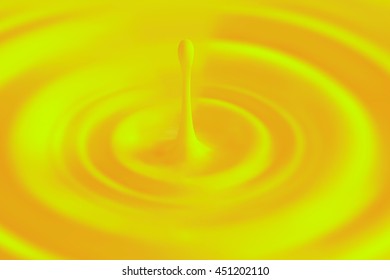 drop of orange juice splashing and making ripple or circle. 3D illustration. Mango juice or yellow liquid. Orange water.