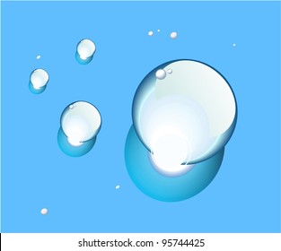 a drop of water on a blue background of a large size