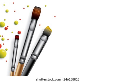 Drops of paint and brushes with place for text