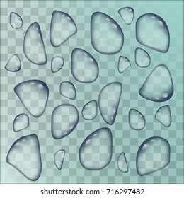Drops of water of different sizes on a transparent background