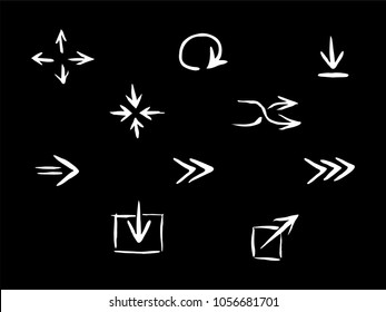 Drown white vector arrows set for web design, isolated on black background. Flat brush elements kit for website navigation elements, icon or button. App element for UI design or application interface.