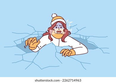 Drowning woman is trying to get out of hole in which fell while walking on frozen lake for concept adverse environmental conditions. Drowning girl got into trouble after natural disaster 