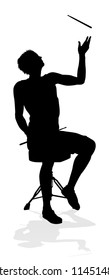 A drummer musician drumming drums in detailed silhouette