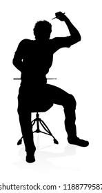 A drummer musician drumming drums in detailed silhouette