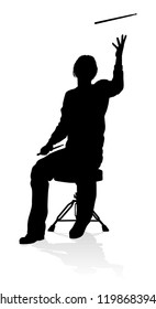 A drummer musician drumming drums in detailed silhouette