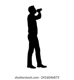 Drunk man in holding bottle and drinking beer while standing isolated