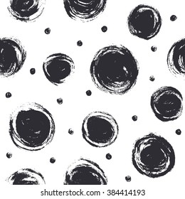 Dry brush texture. Hand drawn black ink spots isolated on white background. Seamless pattern. Polka dot monochrome design.