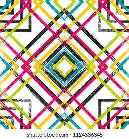Dry brush textured colorful rhombs seamless pattern design. Abstract grungy repeating background