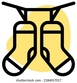 Drying the socks on a string with the help of clips