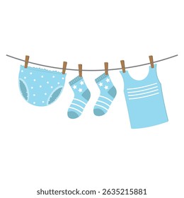 Drying wet children's clothes hung on a clothesline