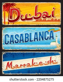 Dubai, Casablanca, Marrakesh city travel stickers and plates, vector vintage signs. Arab Emirates UAE and Morocco capital cities travel retro stickers, destination voyage tin signs and luggage labels