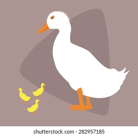 duck with ducklings on brown
