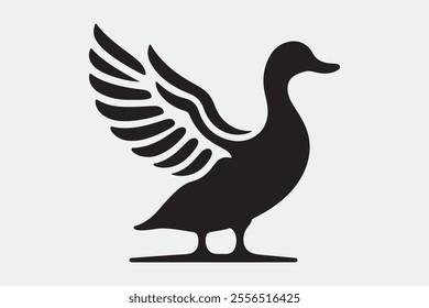 A duck standing upright with its wings spread open.