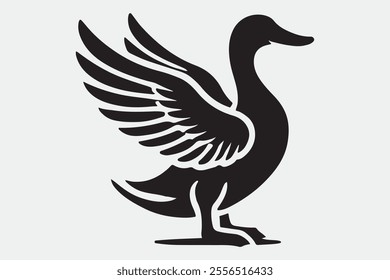 A duck standing upright with its wings spread open.