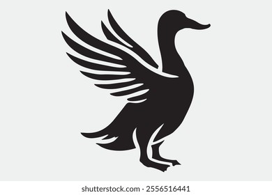 A duck standing upright with its wings spread open.