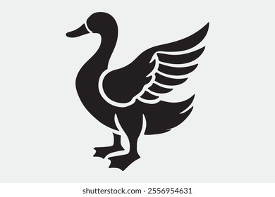 A duck standing upright with its wings spread open.