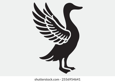 A duck standing upright with its wings spread open.