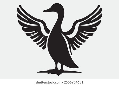 A duck standing upright with its wings spread open.