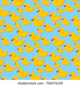 Duck toy seamless pattern, kid cartoon background or child decoration tracery tile for wallpaper, wrapping paper or textile fabric print design template. Vector flat yellow ducks backdrop illustration