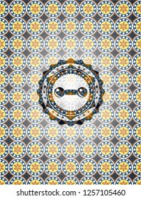 dumbbell icon inside arabic badge background. Arabesque decoration.