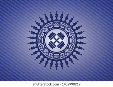 dumbbell icon inside badge with jean texture