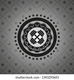 dumbbell icon inside black badge
