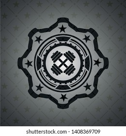 dumbbell icon inside black emblem