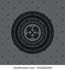 dumbbell icon inside black emblem