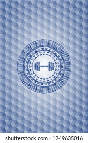 dumbbell icon inside blue badge with geometric pattern background.