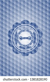 dumbbell icon inside blue badge with geometric background.