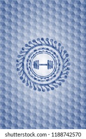dumbbell icon inside blue emblem or badge with geometric pattern background.