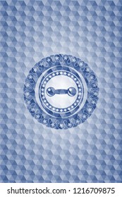 dumbbell icon inside blue emblem with geometric pattern background.