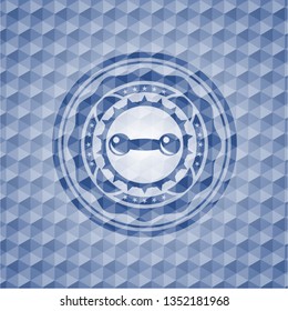 dumbbell icon inside blue emblem or badge with abstract geometric pattern background.