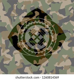 dumbbell icon inside camo emblem