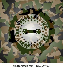dumbbell icon inside camo emblem