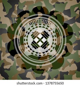 dumbbell icon inside camo emblem