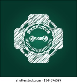 dumbbell icon inside chalk emblem written on a blackboard