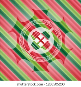 dumbbell icon inside christmas colors style emblem.